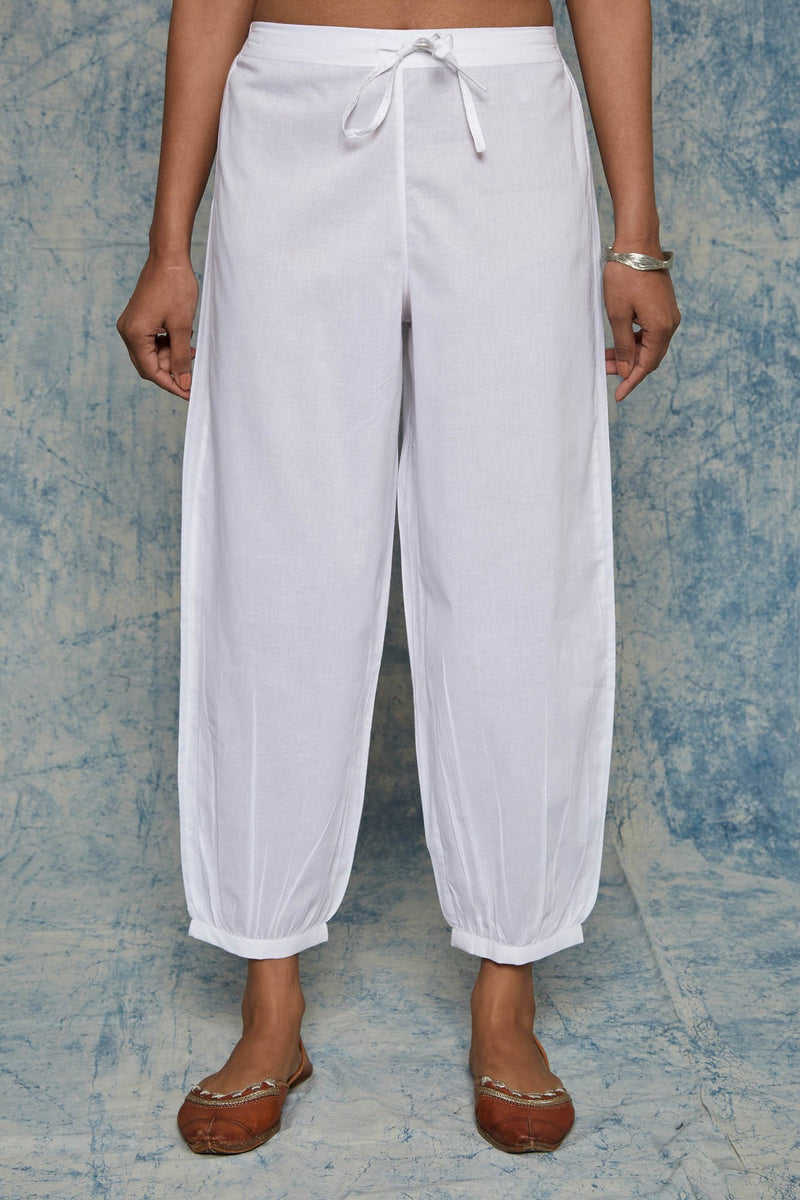 White Printed Harem Pants Design by CoralbySeema at Pernias Pop Up Shop  2023